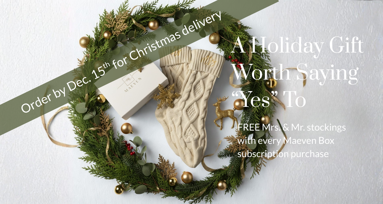 christmas wreath with a bridal gift box and knit christmas stockings