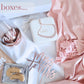 A satin robe, Mrs. travel jewelry box, rose gold bracelet, skin care, Mrs. wine glass 