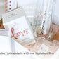 Maeven Signature Box with bride and groom champagne flutes, his and her vow books, wedding planner, ring box, and love balloon